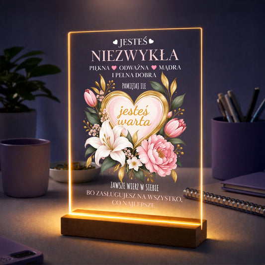 Elegancki tekst na szkle akrylowym z motywującym cytatem jesteś niezwykła dla kobiety